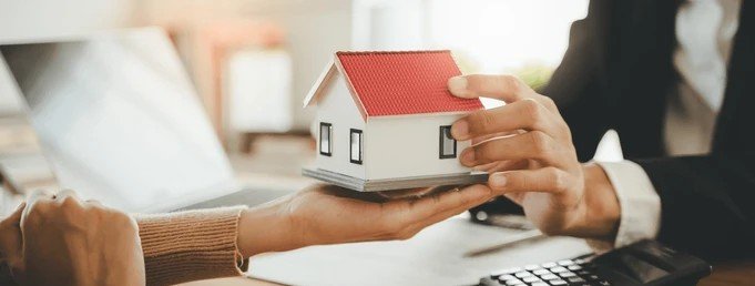 Handing over a model house representing rental property handovers and security deposit deductions in the UAE.